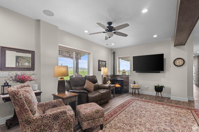 22 Old Ranch Rd, Montpelier, ID 83254 - living area with wood finished floors, a ceiling fan, recessed lighting, and baseboards