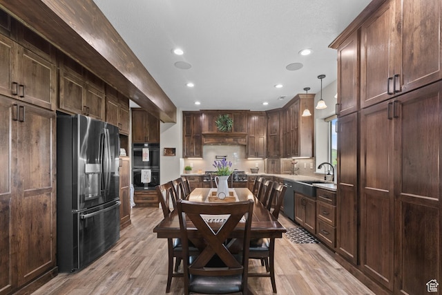 22 Old Ranch Rd, Montpelier, ID 83254 - dining room with light wood-type flooring and recessed lighting