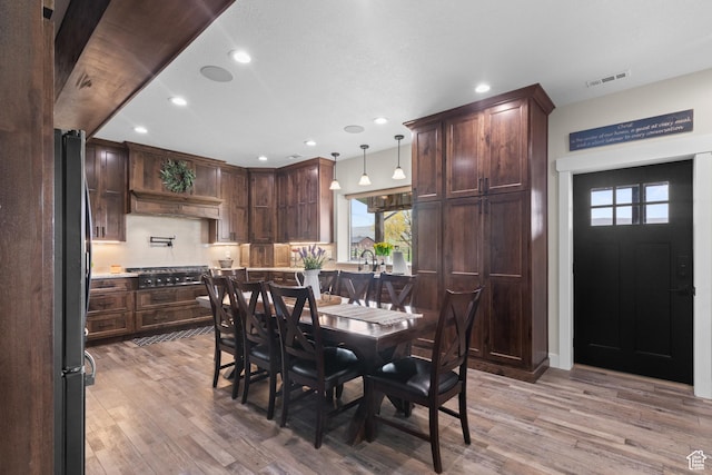 22 Old Ranch Rd, Montpelier, ID 83254 - dining area with wood finished floors and recessed lighting
