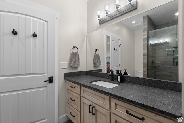 22 Old Ranch Rd, Montpelier, ID 83254 - full bathroom with a stall shower, vanity, toilet, and recessed lighting