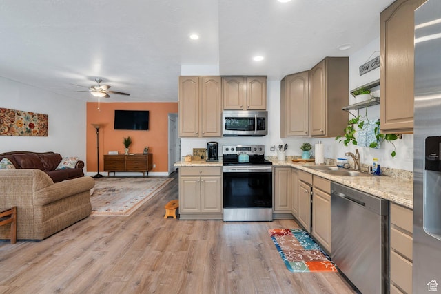 861 N 1100 E, Pleasant Grove, UT 84062 - kitchen with appliances with stainless steel finishes, a sink, open floor plan, ceiling fan, and light wood finished floors