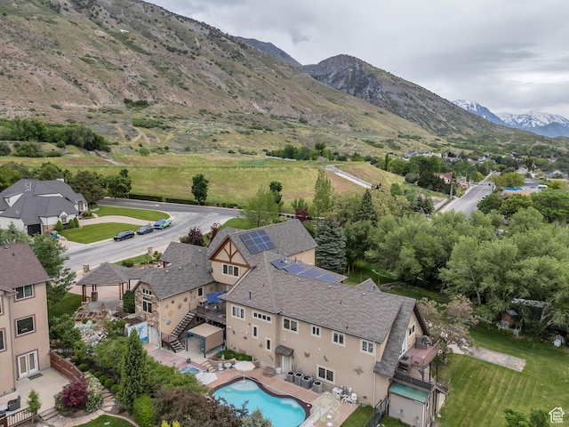 861 N 1100 E, Pleasant Grove, UT 84062 - aerial perspective of suburban area featuring a pool and a mountainous background