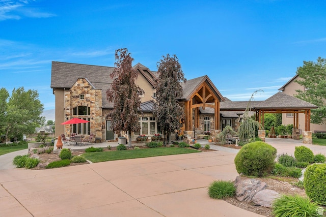 861 N 1100 E, Pleasant Grove, UT 84062 - view of front of home featuring stone siding