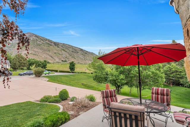 861 N 1100 E, Pleasant Grove, UT 84062 - view of patio with a mountain view and outdoor dining area