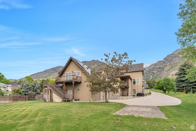 861 N 1100 E, Pleasant Grove, UT 84062 - back of house with stairs, stucco siding, and a deck with mountain view