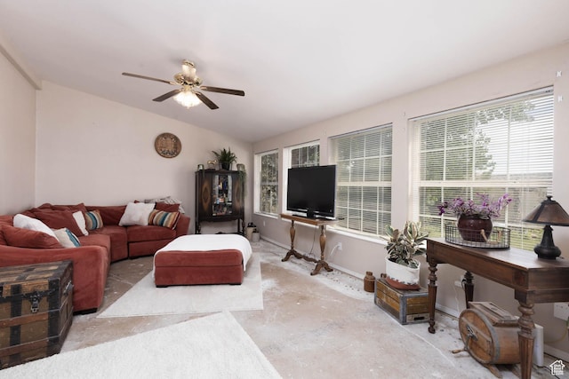 1090 N 200 E, Ferron, UT 84523 - living room with vaulted ceiling, a ceiling fan, baseboards, and unfinished concrete flooring