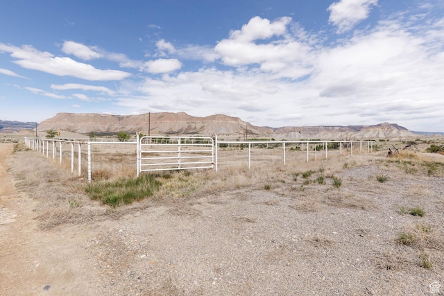 1090 N 200 E, Ferron, UT 84523 - view of yard featuring fence, a mountain view, and a view of countryside