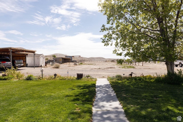 1090 N 200 E, Ferron, UT 84523 - view of grassy yard featuring an outbuilding