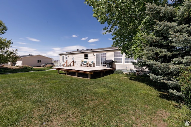 1090 N 200 E, Ferron, UT 84523 - rear view of house with a deck and a yard