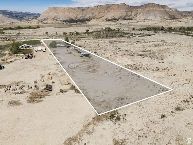 1090 N 200 E, Ferron, UT 84523 - view of rural area with property parcel outlined, a desert landscape, and a mountainous background
