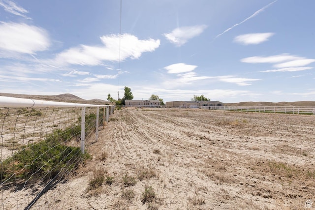 1090 N 200 E, Ferron, UT 84523 - view of yard featuring a view of rural / pastoral area, fence, and a mountain view