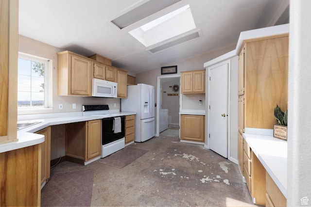 1090 N 200 E, Ferron, UT 84523 - kitchen with white appliances, vaulted ceiling, light brown cabinets, light countertops, and a skylight