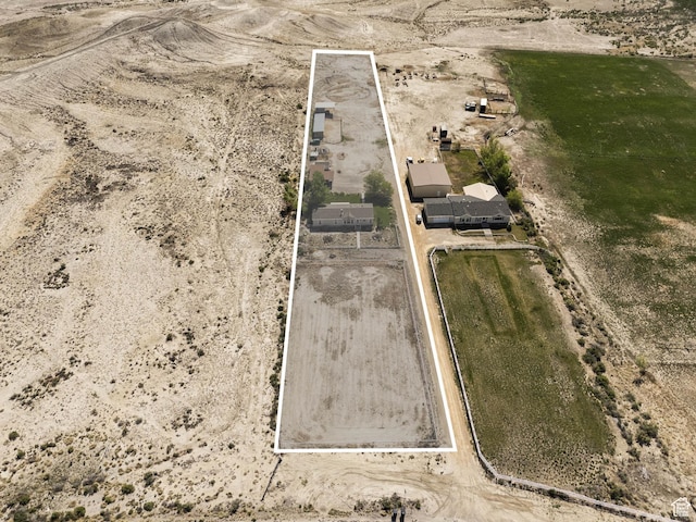 1090 N 200 E, Ferron, UT 84523 - aerial view of sparsely populated area with property parcel outlined and a desert landscape