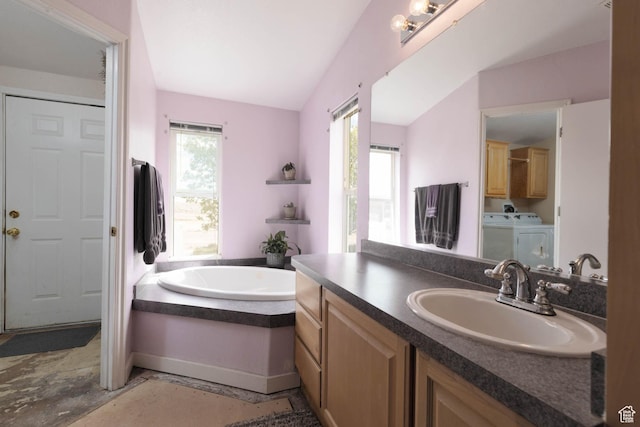 1090 N 200 E, Ferron, UT 84523 - full bathroom with a bath, vanity, washer and clothes dryer, unfinished concrete flooring, and lofted ceiling