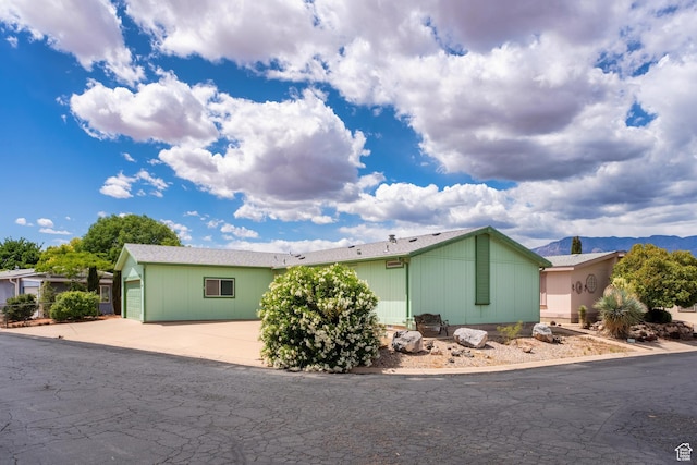 39 N 3850 W, Hurricane, UT 84737 - view of side of property with an attached garage and concrete driveway