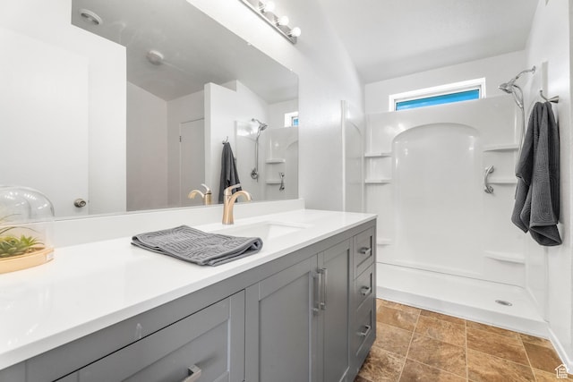 39 N 3850 W, Hurricane, UT 84737 - bathroom featuring a shower, stone finish flooring, and vanity