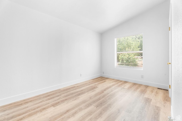 39 N 3850 W, Hurricane, UT 84737 - unfurnished room with lofted ceiling, light wood-style floors, and baseboards