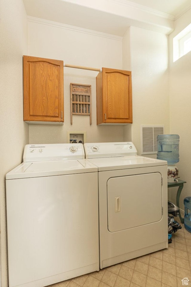 5177 W 1525 S, Cedar City, UT 84720 - washroom featuring cabinet space, washer and dryer, and ornamental molding
