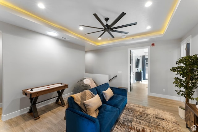 5266 W 2480 S Unit 132, Hurricane, UT 84737 - sitting room featuring a tray ceiling, recessed lighting, baseboards, ceiling fan, and light wood-style floors