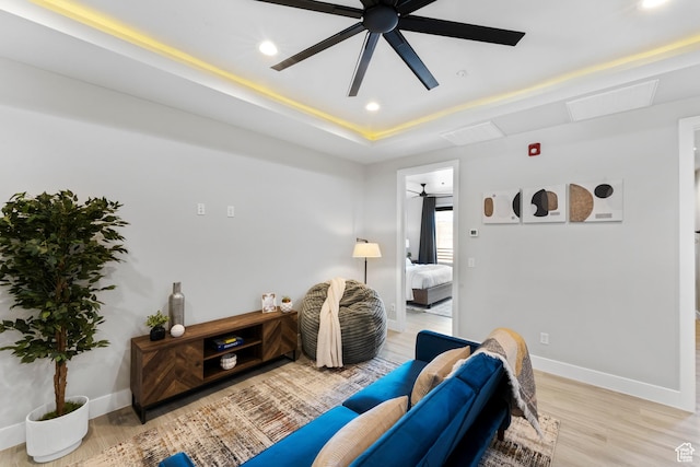 5266 W 2480 S Unit 132, Hurricane, UT 84737 - living area featuring recessed lighting, baseboards, ceiling fan, light wood-style flooring, and a raised ceiling