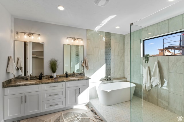 5266 W 2480 S Unit 132, Hurricane, UT 84737 - full bathroom with a freestanding bath, double vanity, a walk in shower, and recessed lighting