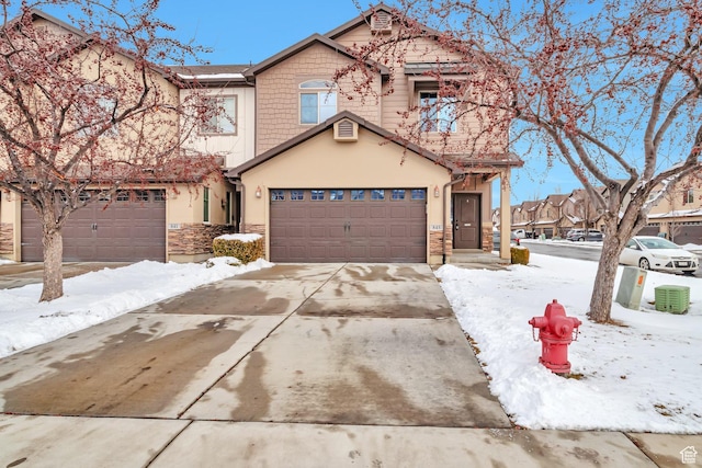 845 S 1840 W, Orem, UT 84059 - traditional-style house with stucco siding, driveway, and stone siding