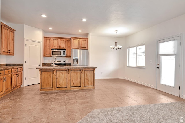 845 S 1840 W, Orem, UT 84059 - kitchen with stainless steel appliances, a chandelier, a sink, recessed lighting, and an island with sink