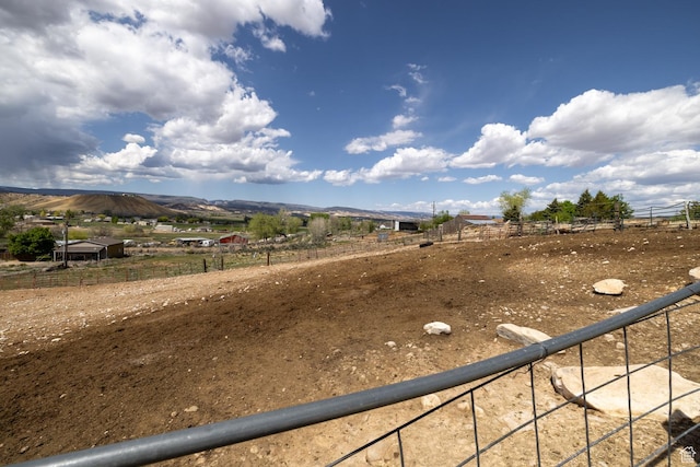 3820 W Main St, Vernal, UT 84078 - view of yard with a view of countryside, a mountain view, and fence