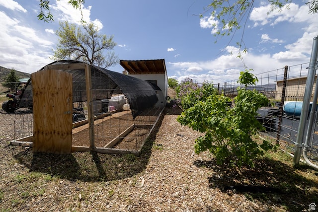 3820 W Main St, Vernal, UT 84078 - view of yard with exterior structure, an outdoor structure, and fence