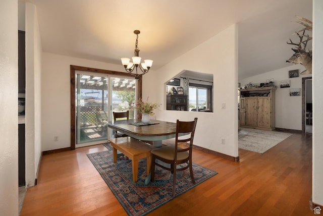3820 W Main St, Vernal, UT 84078 - dining room with a chandelier, wood finished floors, and baseboards