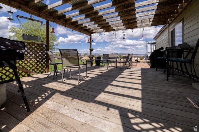 3820 W Main St, Vernal, UT 84078 - wooden deck with outdoor dining area and a pergola