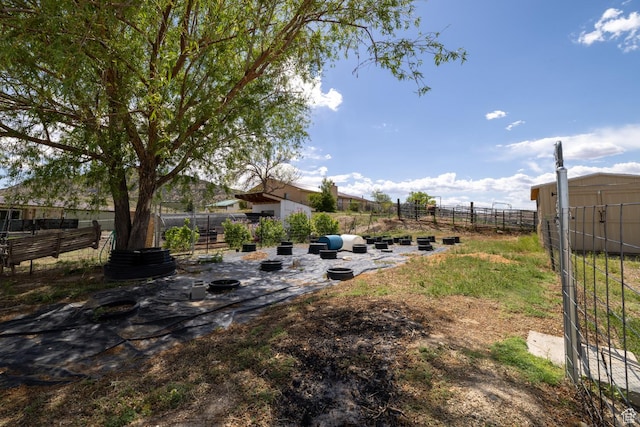 3820 W Main St, Vernal, UT 84078 - view of yard with fence and an outbuilding