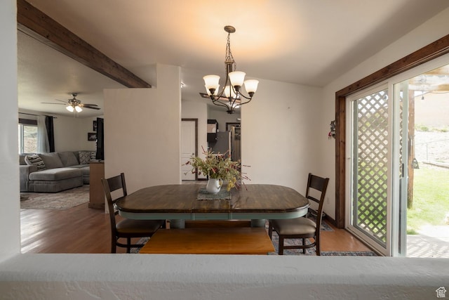 3820 W Main St, Vernal, UT 84078 - dining space with a chandelier, wood finished floors, beam ceiling, and ceiling fan