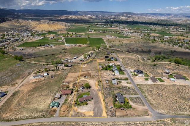 3820 W Main St, Vernal, UT 84078 - aerial view of property's location with a mountain backdrop and property boundaries highlighted