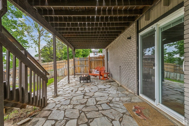 11842 S Elm Ridge Rd E, Sandy, UT 84094 - fenced backyard with a patio area and an outdoor fire pit