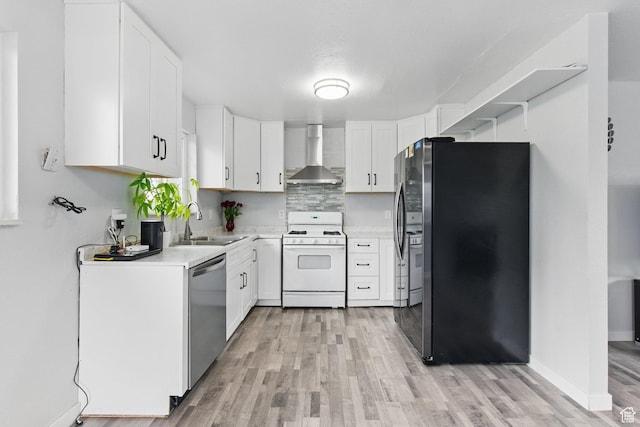493 N 1025 W St W, Orem, UT 84057 - kitchen featuring white range with gas stovetop, wall chimney range hood, refrigerator with ice dispenser, stainless steel dishwasher, and a sink