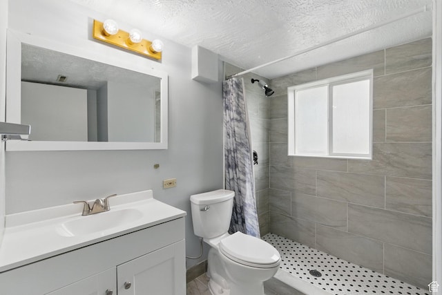 493 N 1025 W St W, Orem, UT 84057 - bathroom featuring a shower stall, vanity, toilet, baseboards, and a textured ceiling