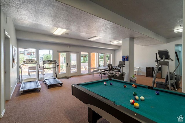 rec room featuring a textured ceiling, carpet flooring, french doors, and billiards table