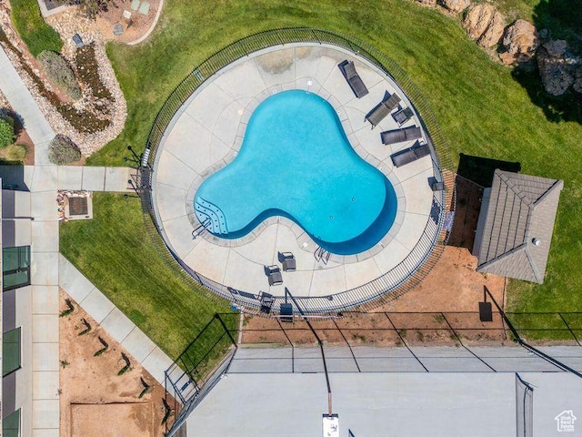 drone / aerial view of a pool