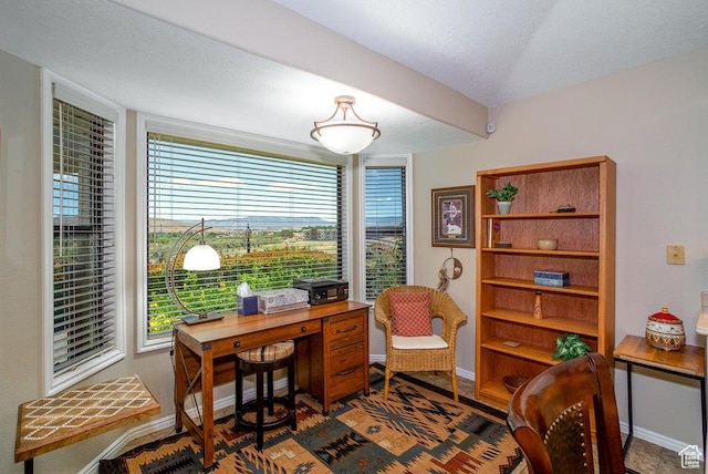office space featuring baseboards