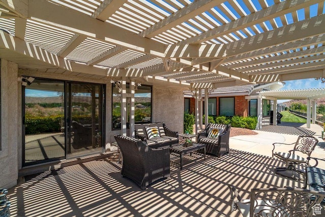 view of patio with a pergola and an outdoor hangout area