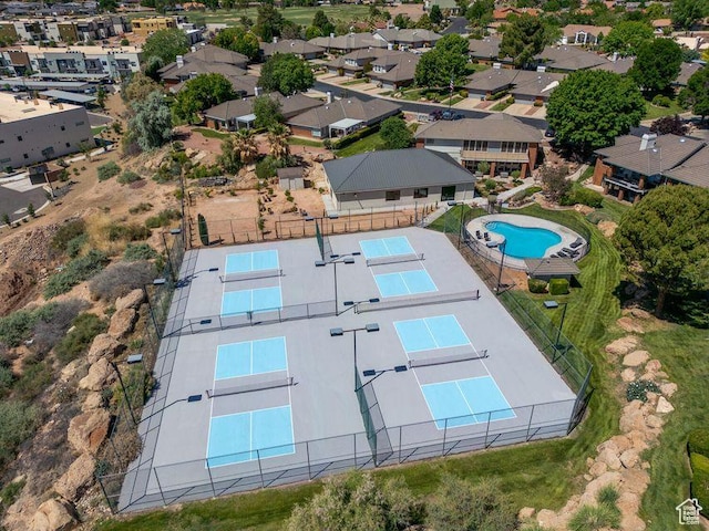 drone / aerial view of a pool
