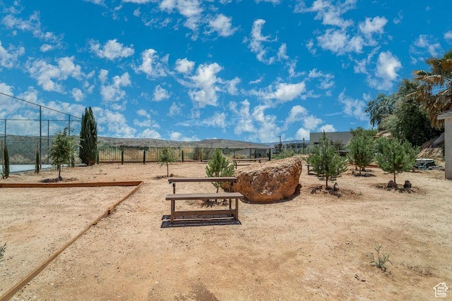 view of yard featuring fence