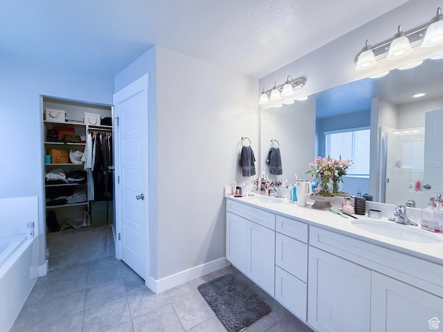 3921 W 1850 N, Lehi, UT 84043 - full bathroom with a stall shower, double vanity, a spacious closet, tile patterned flooring, and a tub
