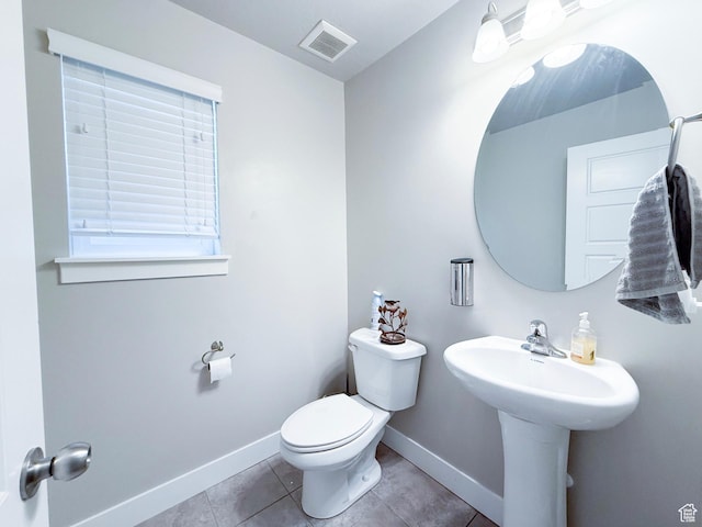 3921 W 1850 N, Lehi, UT 84043 - bathroom featuring baseboards, toilet, and tile patterned floors