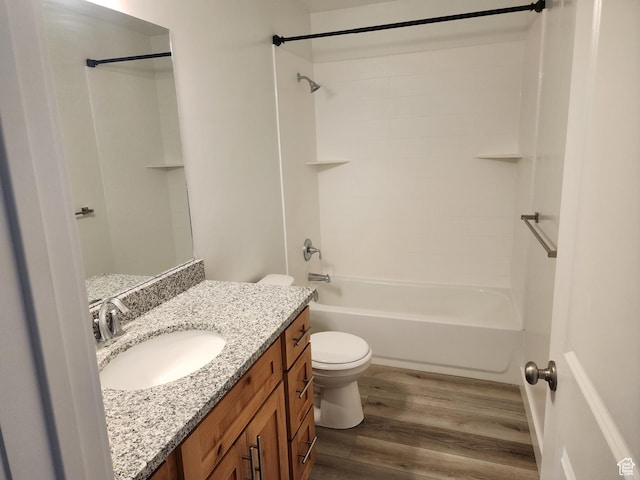 314 E 38th St, South Ogden, UT 84405 - bathroom with toilet, wood finished floors, shower / washtub combination, and vanity