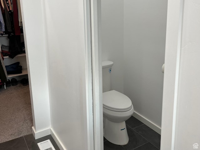 365 N 100 E, Ferron, UT 84523 - bathroom featuring tile patterned flooring, toilet, and baseboards