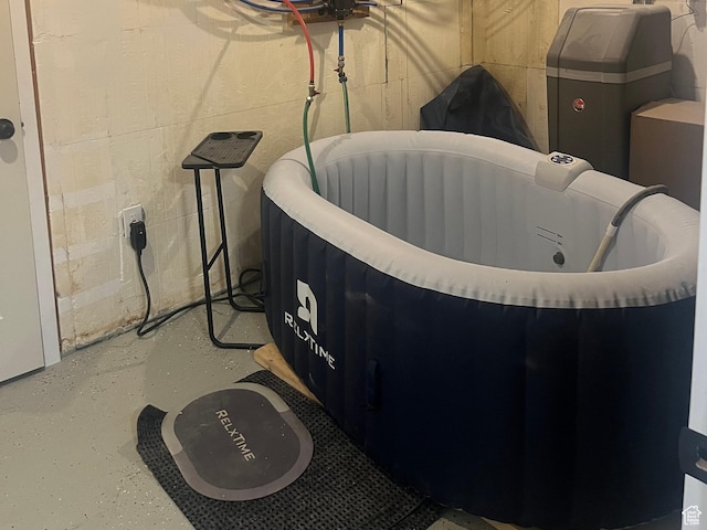 365 N 100 E, Ferron, UT 84523 - detailed view of a water softener system and concrete block wall