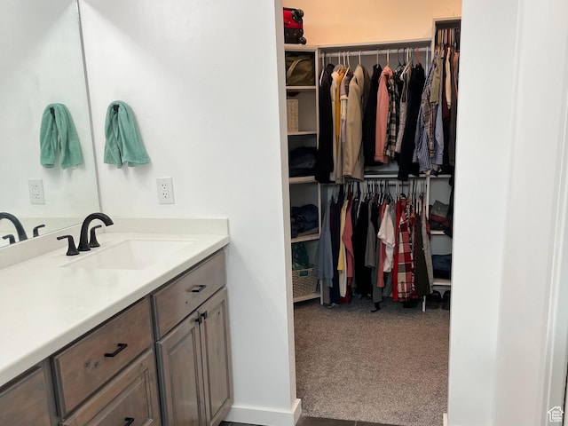 365 N 100 E, Ferron, UT 84523 - bathroom with a spacious closet and vanity