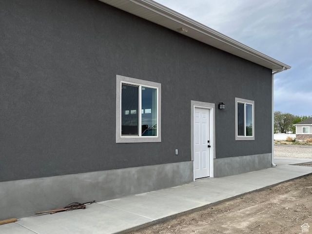 365 N 100 E, Ferron, UT 84523 - rear view of property featuring stucco siding